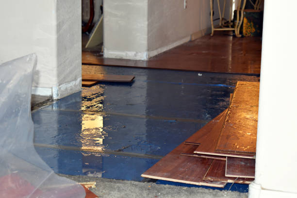 Professional Storm Water Damage Restoration technician working in Cost, TX